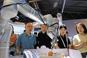 JD Cloud разкрива напредъка на AI на конференцията Cloud City през 2025 г. · TechNode